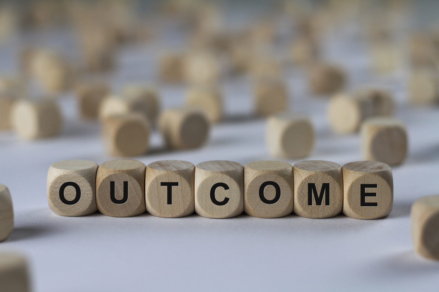 outcome - cube with letters, sign with wooden cubes